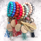 Solid Colored Silicone Wristlet Bracelet Keychain with Wooden Disc and Tassel